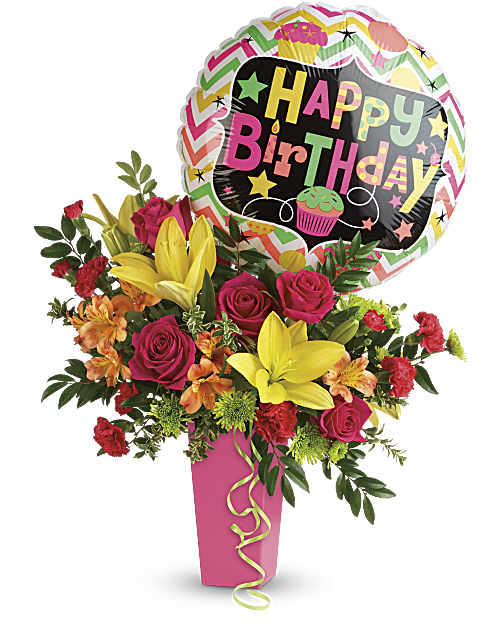 Birthday bouquet with roses, lilies, and a "Happy Birthday" balloon