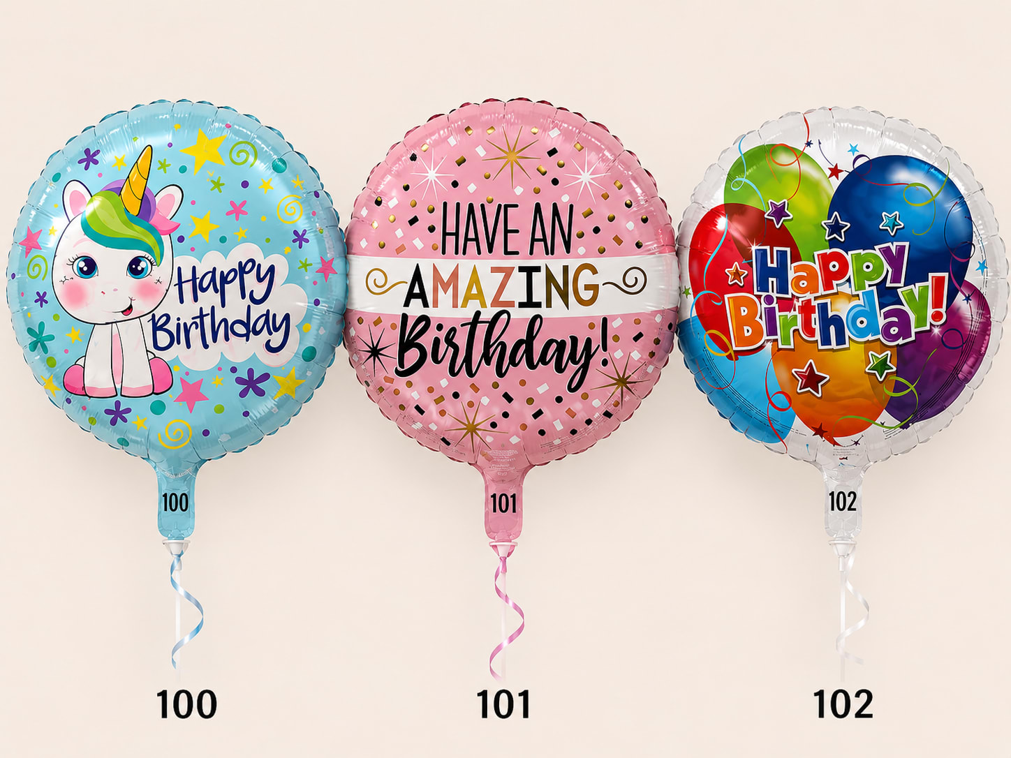 Three birthday balloons with unicorn and birthday messages