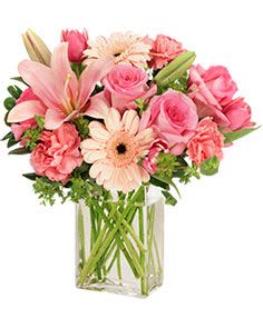 Pink mixed bouquet in a clear glass vase