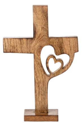 Wooden cross with a heart cutout on a base