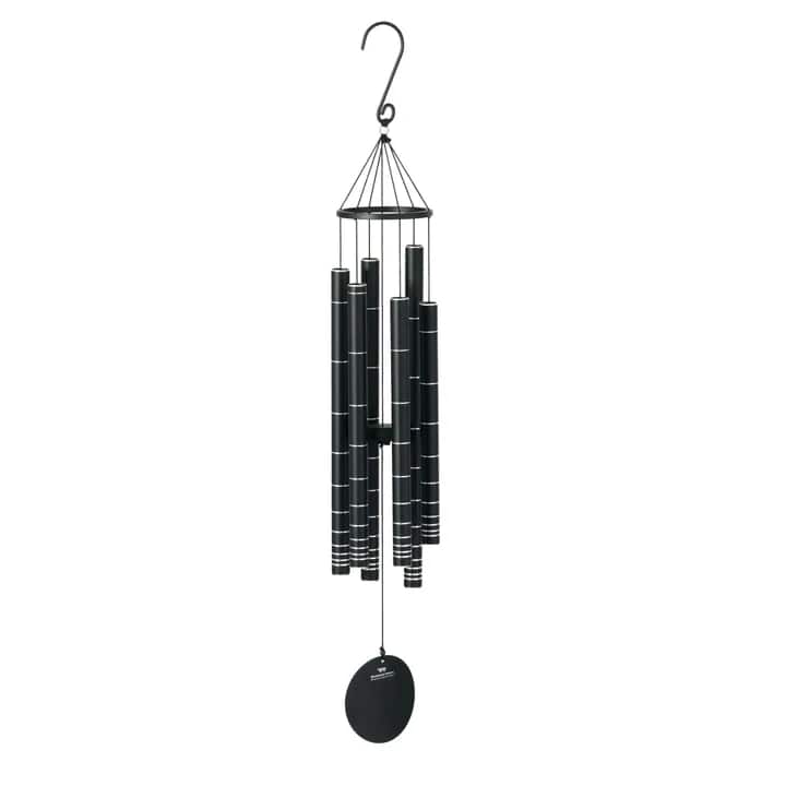 Black hanging wind chime with metal tubes and a round clapper
