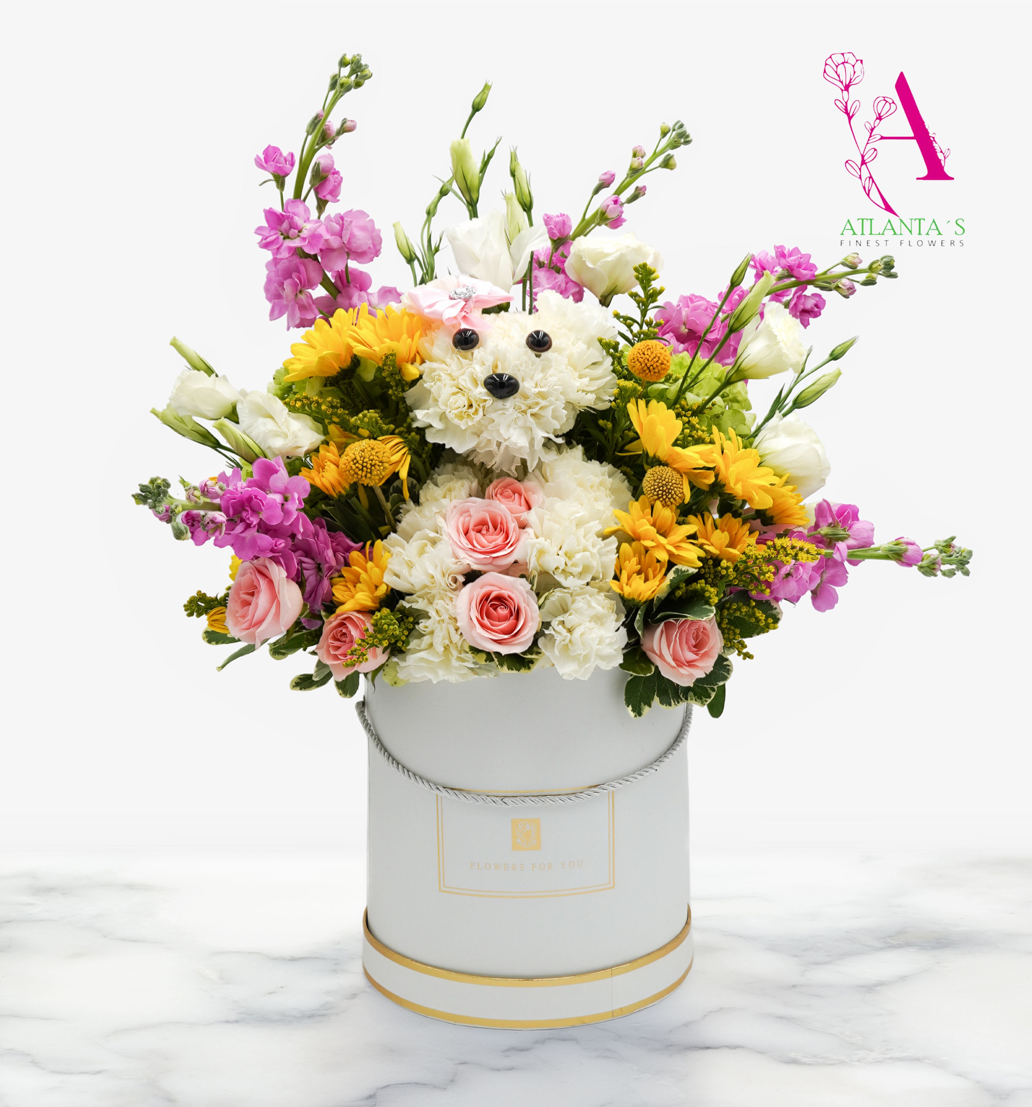 Puppy's Bright Day - Includes White carnations, Pom daisy yellow, Pink spray roses, Lisianthus, Hydrangeas, mini green, Craspedia, Stock, and mixed greenery  Box Container Material Size: 7H"/6W"