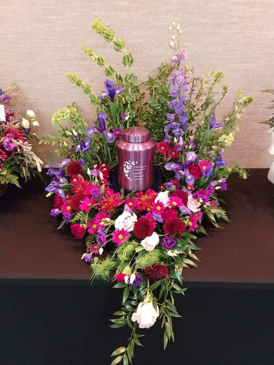 Purple Passion Urn Arrangement. - Was their favorite color Purple. Did like vibrant colors. This a perfect send off for them.