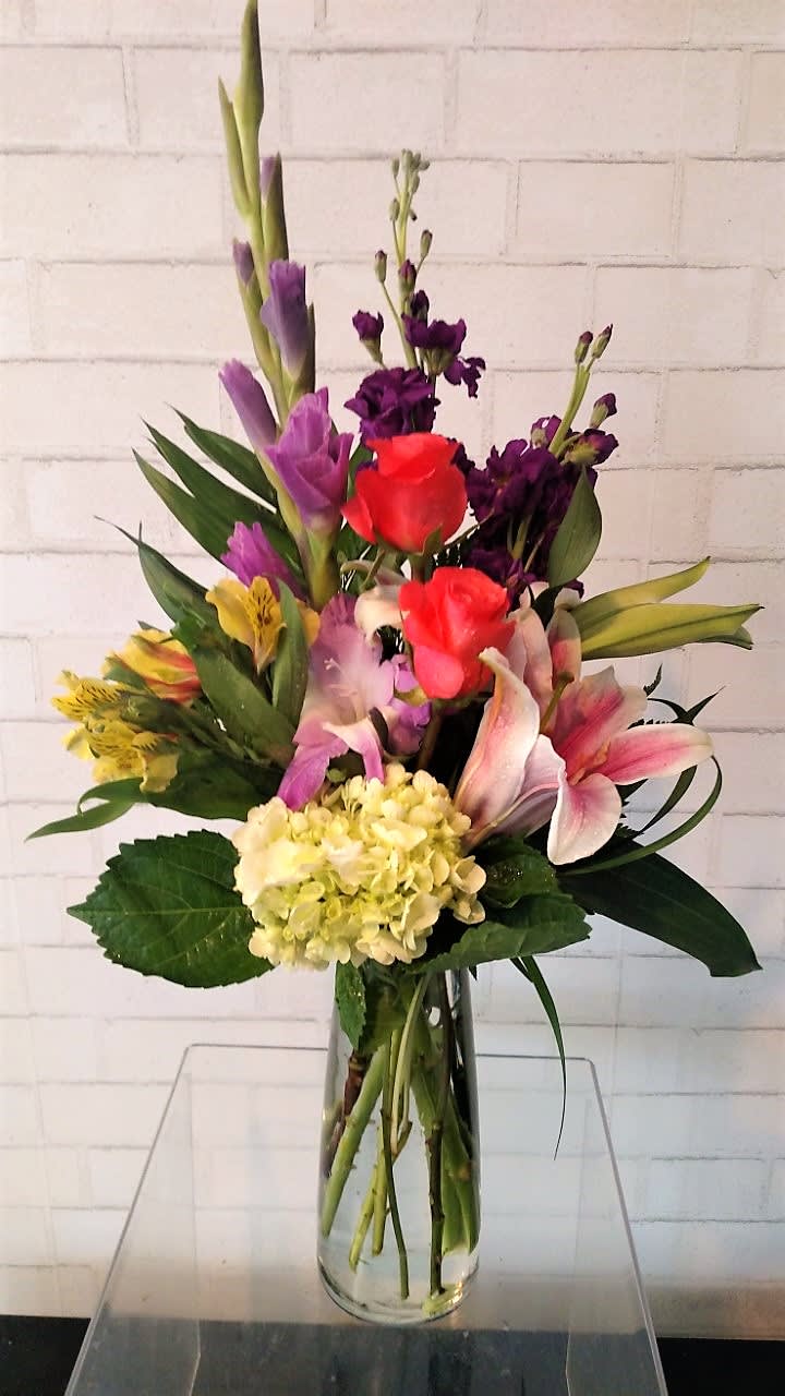 Modern Blossom - A modern twist of fresh vibrant blooms. Can be made in a variety of bright colors. Perfect for every occasion!