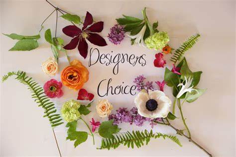 Assorted flowers arranged around the words "Designers Choice"