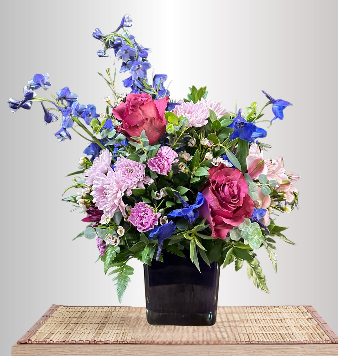Moonlight Bouquet - This fun bouquet combines purple and blue flowers for a sweet gift fot any occasion.
