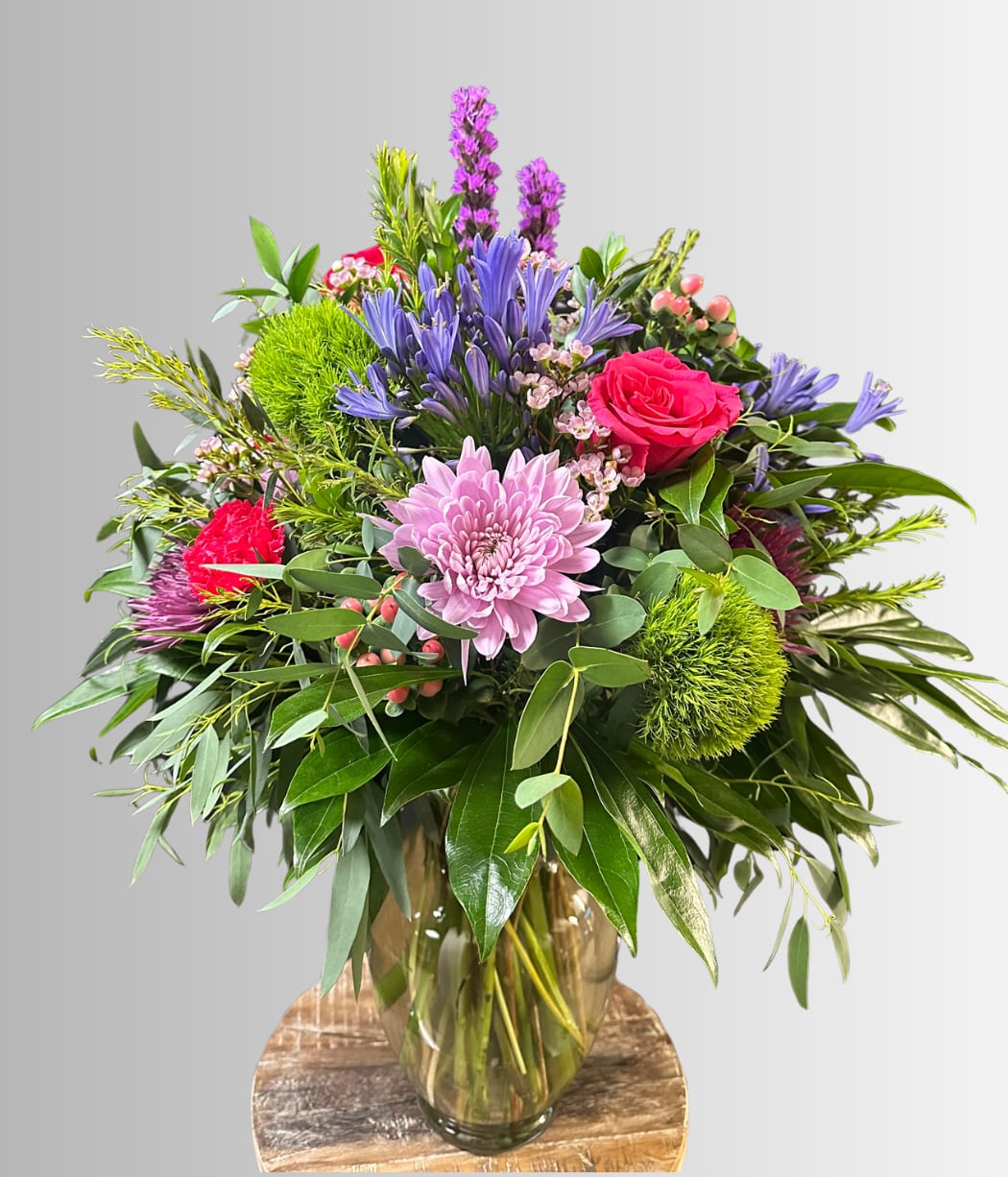 Wild About You Bouquet - Large garden-style bouquet packed full of fun flowers in hues of pink , purple, lavendar, and green. 