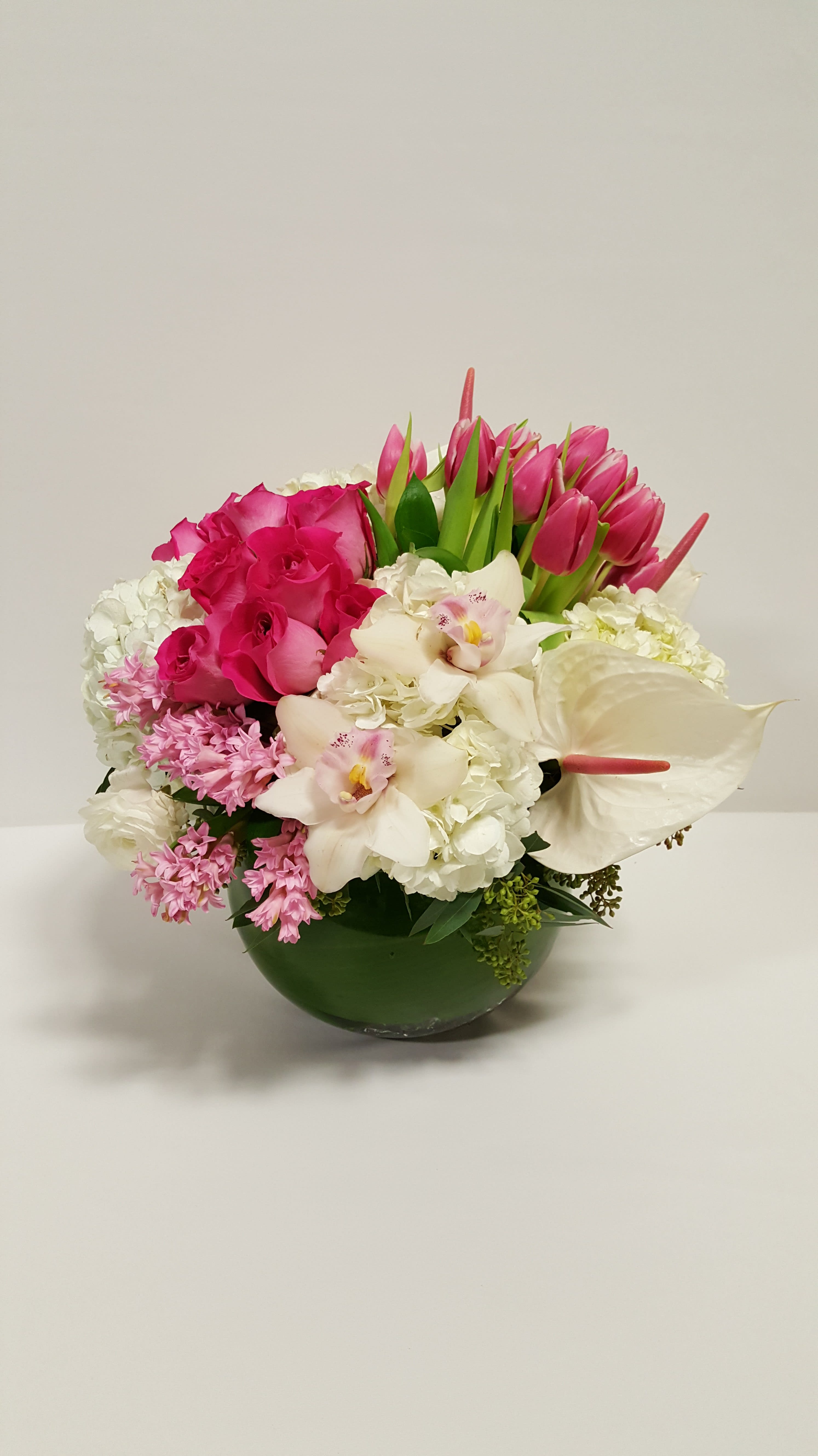 Smiles and Sunshine - a nice fish bowl vase with some lovely pink roses and nice mixture of flowers