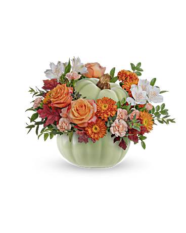 Pumpkin-shaped vase with orange roses and mixed fall flowers