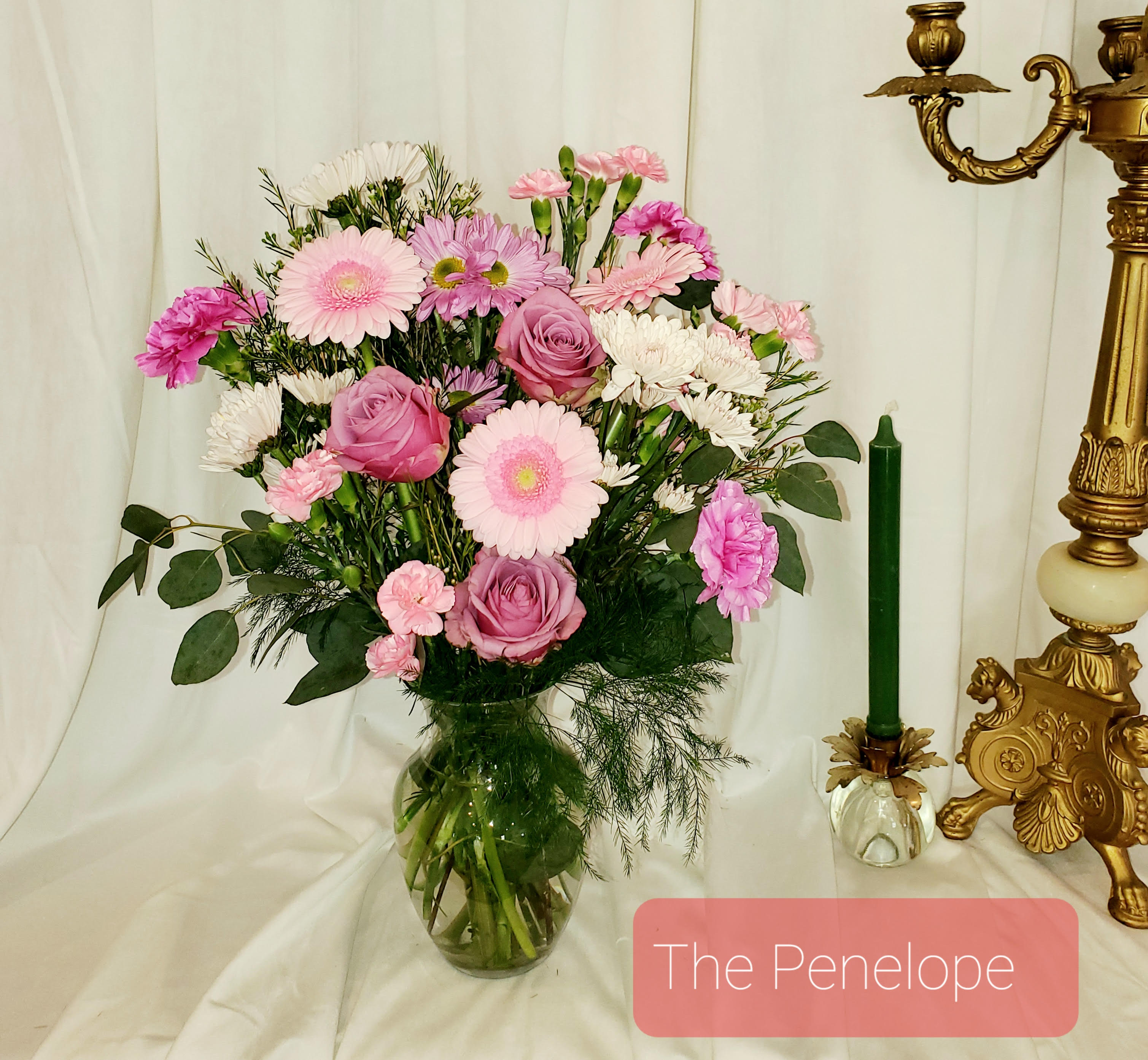 Pink and white mixed bouquet in a glass vase