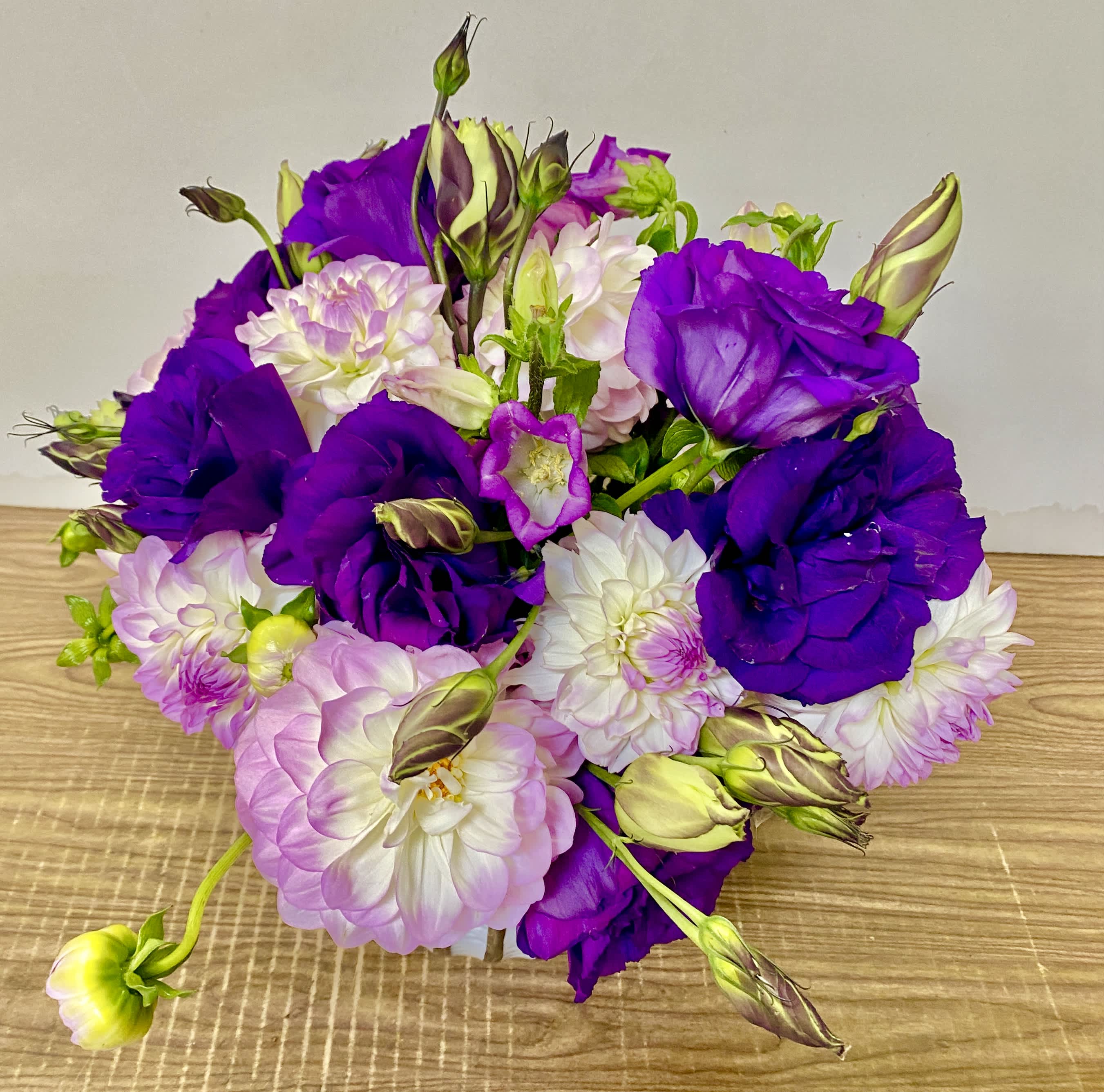 Bouquet of purple and pale pink lisianthus flowers