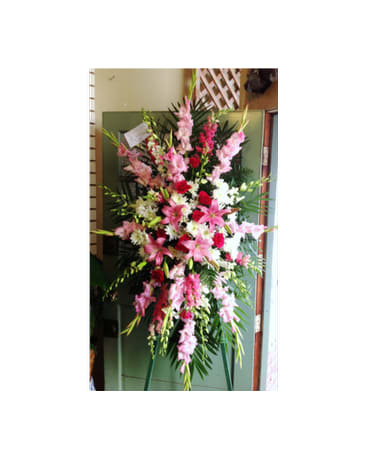 Tall standing floral spray with pink and white flowers