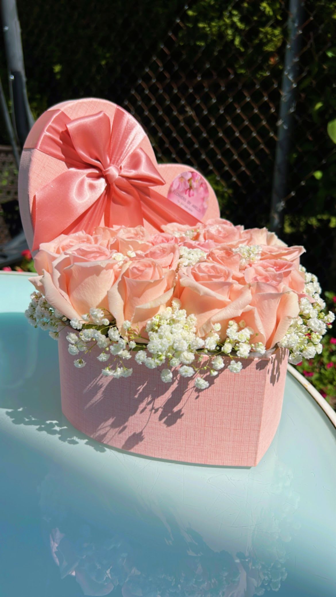 Pink Roses Heart Box  - Heart shaped box overflowing with our premium Ecuadorian grown roses. Heart Box color varies upon availability (Black, White, Pink or Red)  