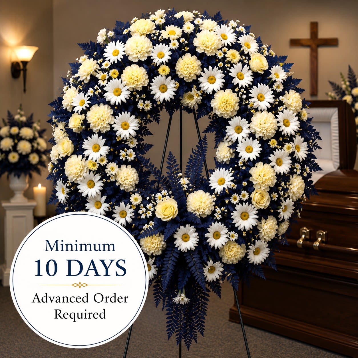 Watanabe Premium Summer's Light (Open Wreath) - For the person who was the Summer's Light of everyone they met in life, this standing wreath will be the perfect send-off. Standing approximately 64" wide and presented on a 6' easel, this arrangement offers a grand and heartfelt tribute. Please note that a minimum days' advanced notice is required to ensure the flowers can be properly staged for quality results.  Key Features:  Stunning Dimensions: Stands approximately 64" wide, creating an impressive and vibrant display.  High-Quality Arrangement: Expertly crafted with a selection of fresh, vibrant flowers that evoke the warmth and brightness of summer.  Elegant Presentation: Mounted on a 6' easel, perfect for memorials, celebrations of life, or any event where a beautiful tribute is desired.  Meaningful Tribute: Designed to honor and celebrate the life of a loved one who brought light and joy to everyone they met.  Celebrate and honor the memory of a loved one with our Summer's Light Standing Wreath, a beautiful and meaningful tribute that reflects their warm and vibrant spirit.