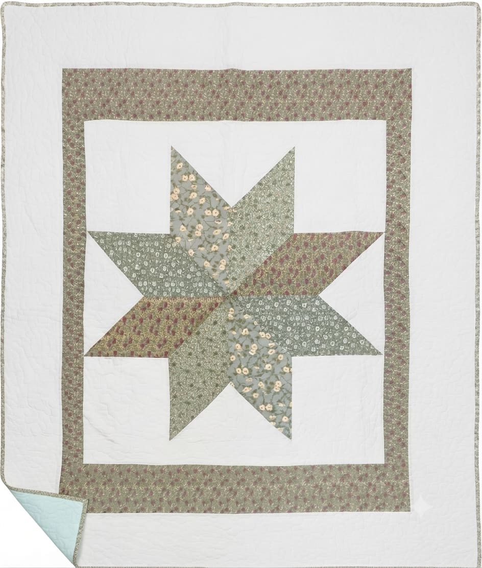 Patchwork quilt with a star pattern in muted floral fabrics