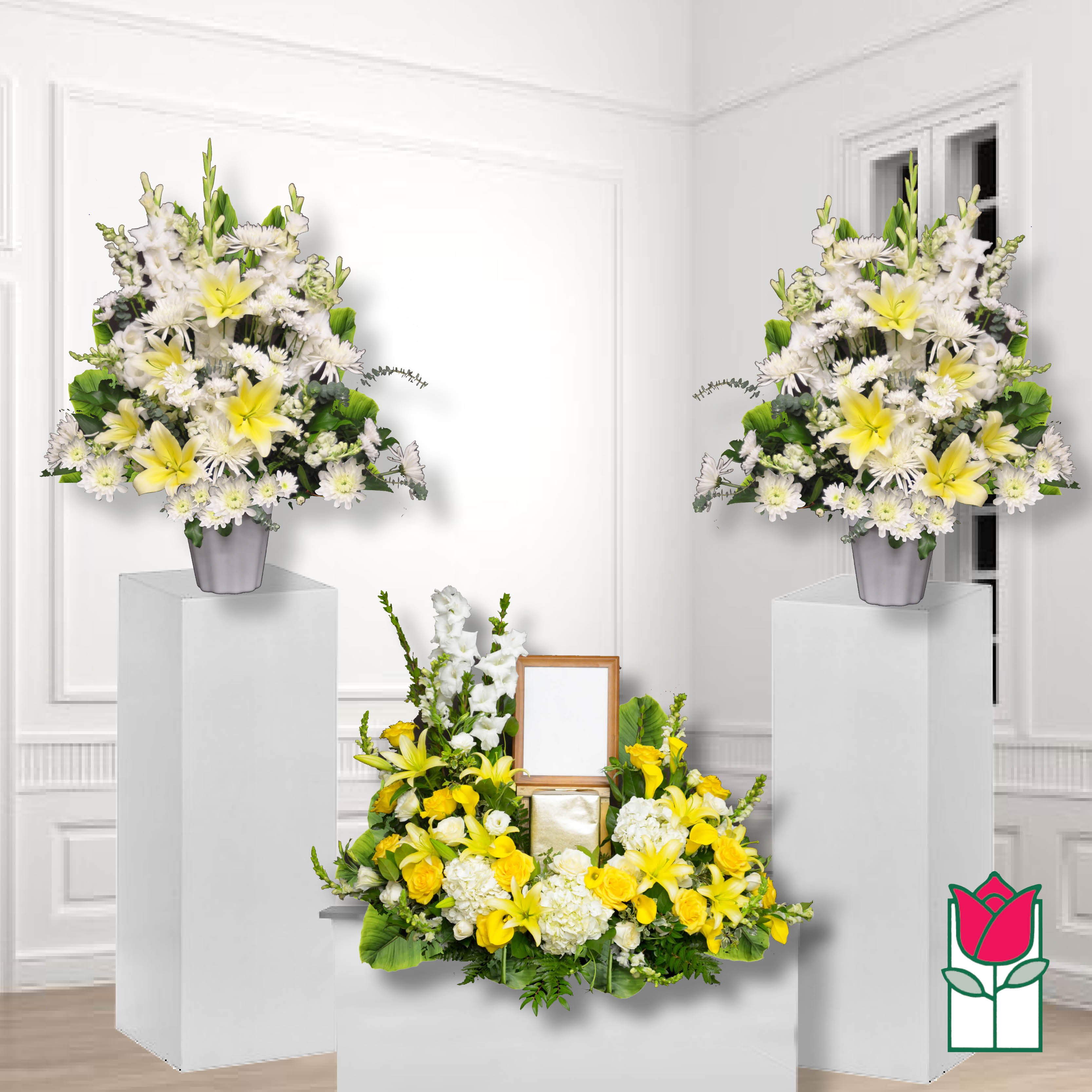 White and yellow floral funeral arrangement with matching pedestal sprays