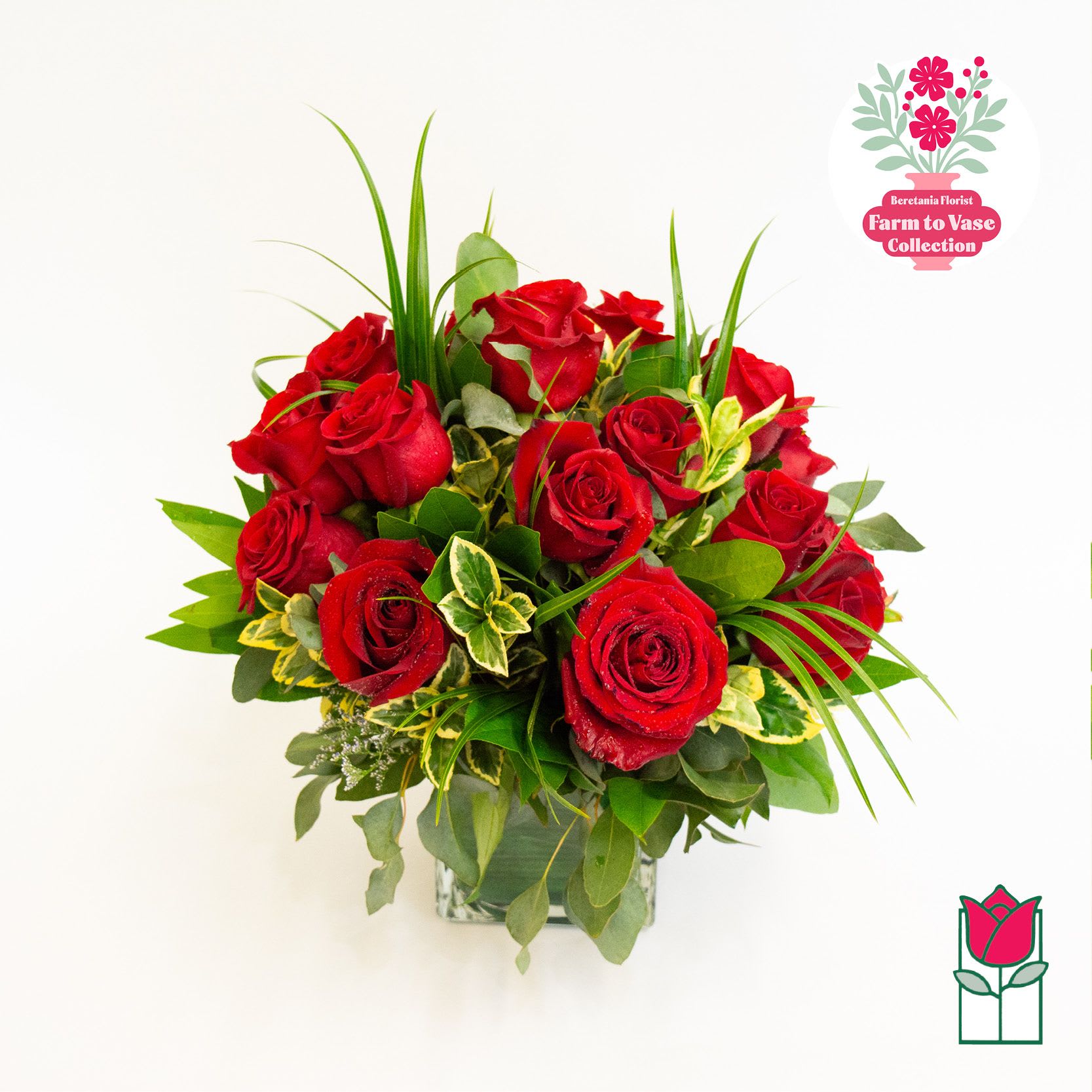 Bouquet of red roses in a clear glass vase