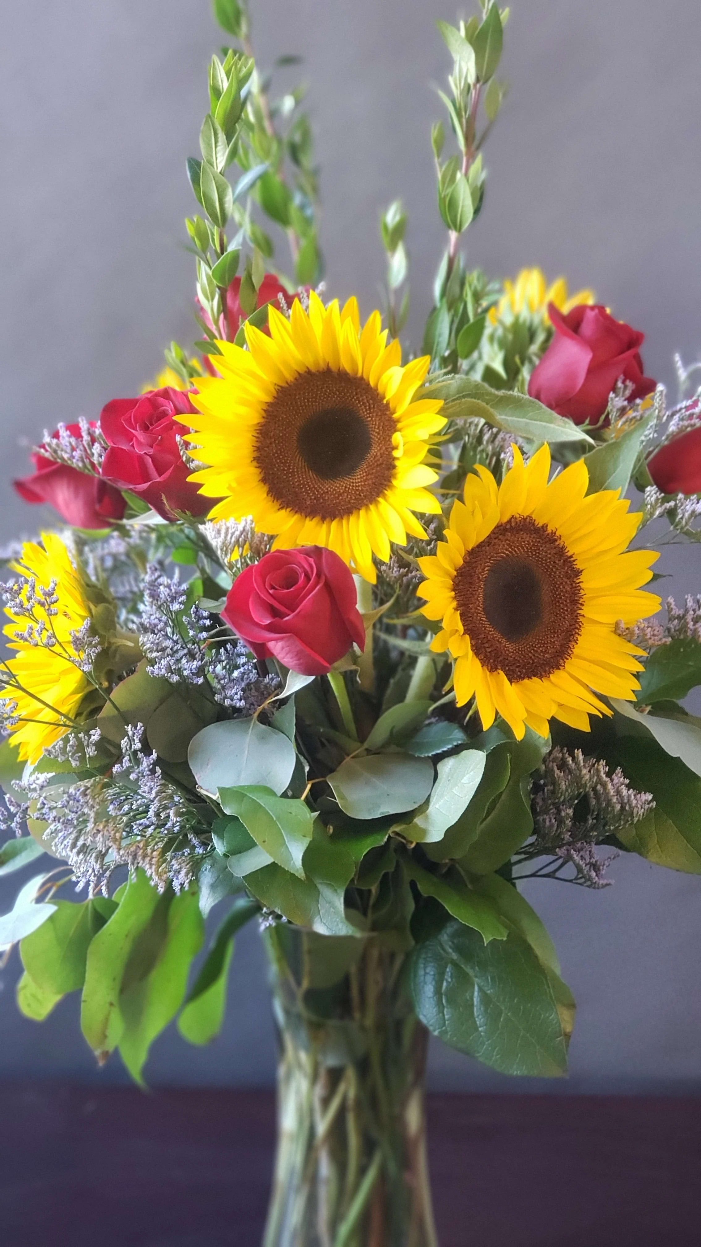 Ruby Sun - Pop of warmth in a glass vase to add sunshine to someone's day.