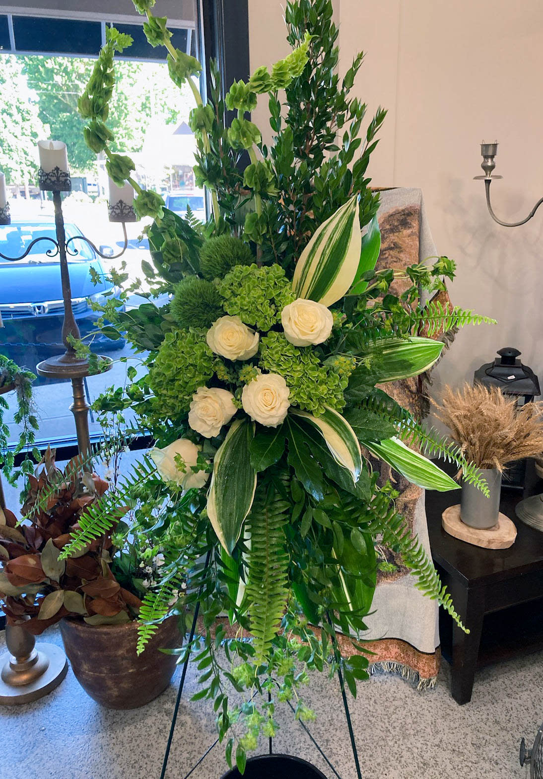 Elegant Green And White Sympathy Stand - Green and white is a combination of peace and hope during a time when sympathy and comfort is needed.