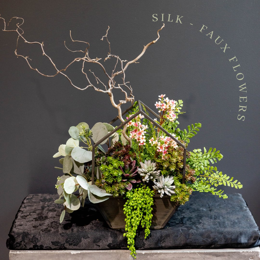 Succulent Terrarium: Real + Silk - Faux Plants/Greenery -  A mix of real greenery that makes for being dried and branches with faux succulents and plants. This is a peaceful arrangement saying to a loved one's home saying, "I'm thinking of you during this hard time."