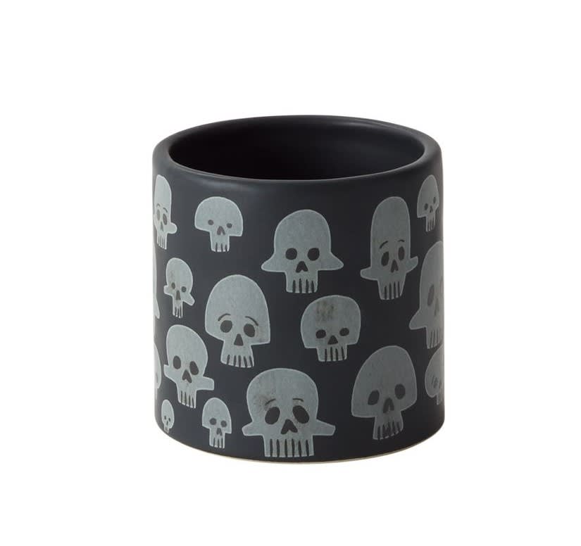Black ceramic pot with gray skull pattern