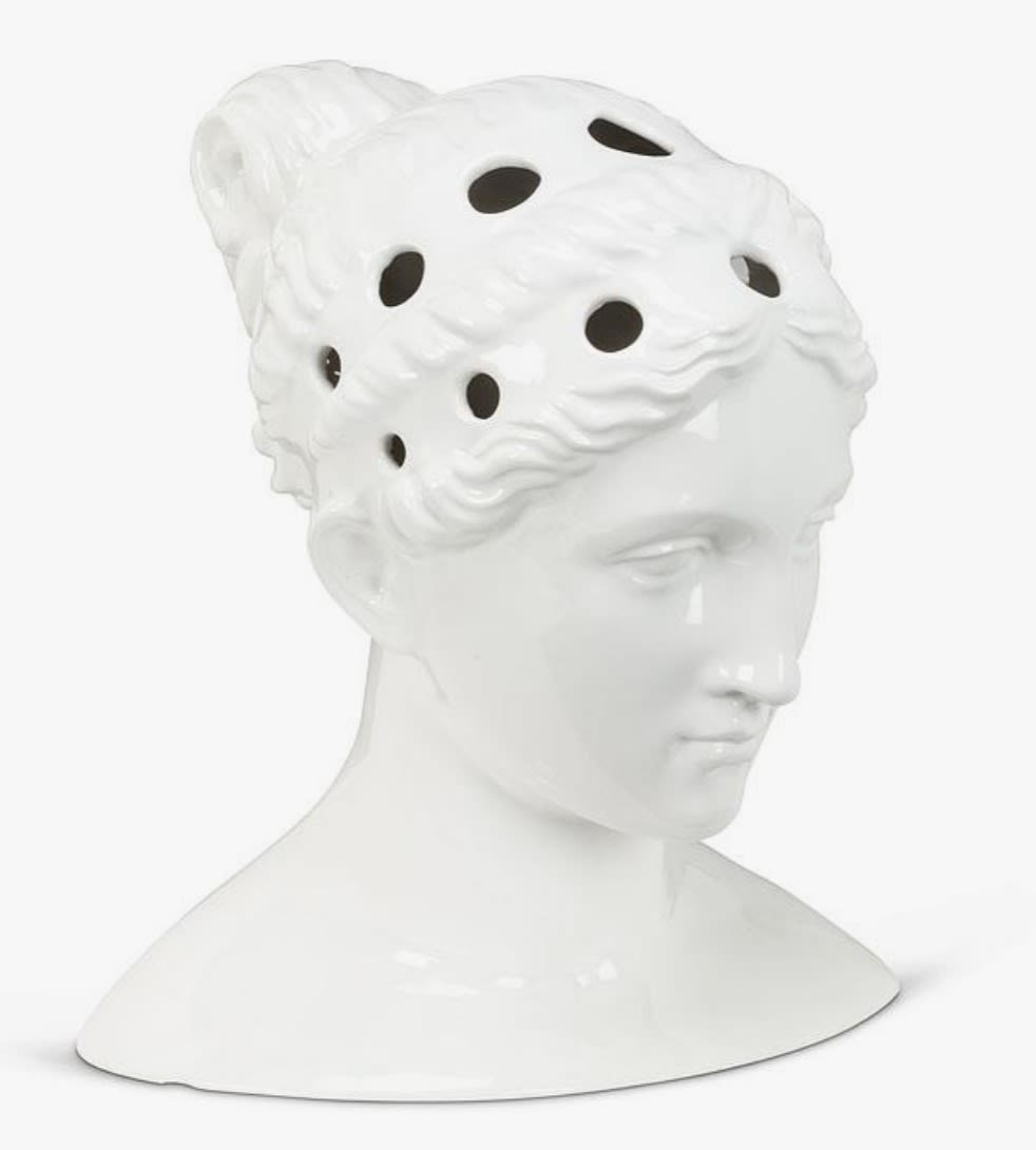 White decorative bust with a perforated sculpted headpiece