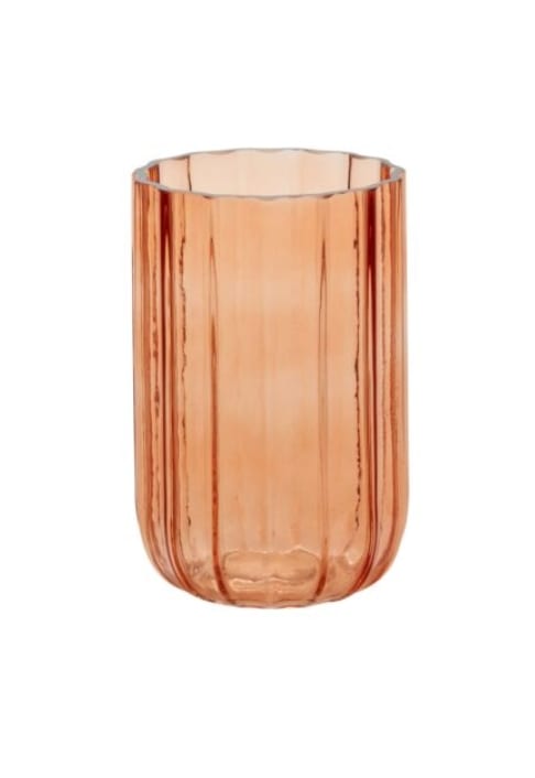 Copper-toned ribbed glass vase on a white background