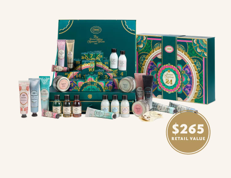 Assorted bath and body gift set in teal decorative boxes