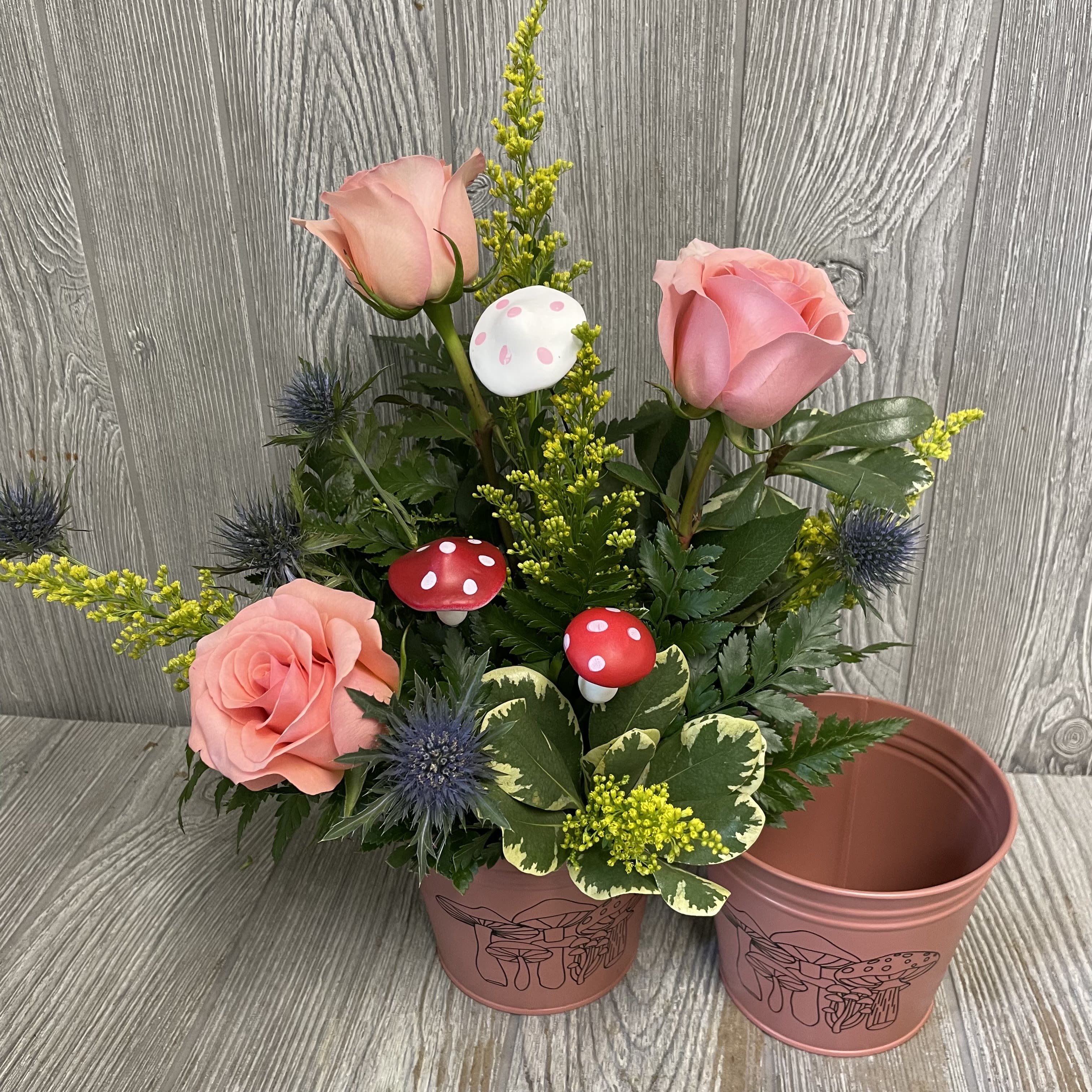Fung Guy - An arrangement of fresh cut flowers in a keepsake metal mushroom container. Flowers and colors may vary. 