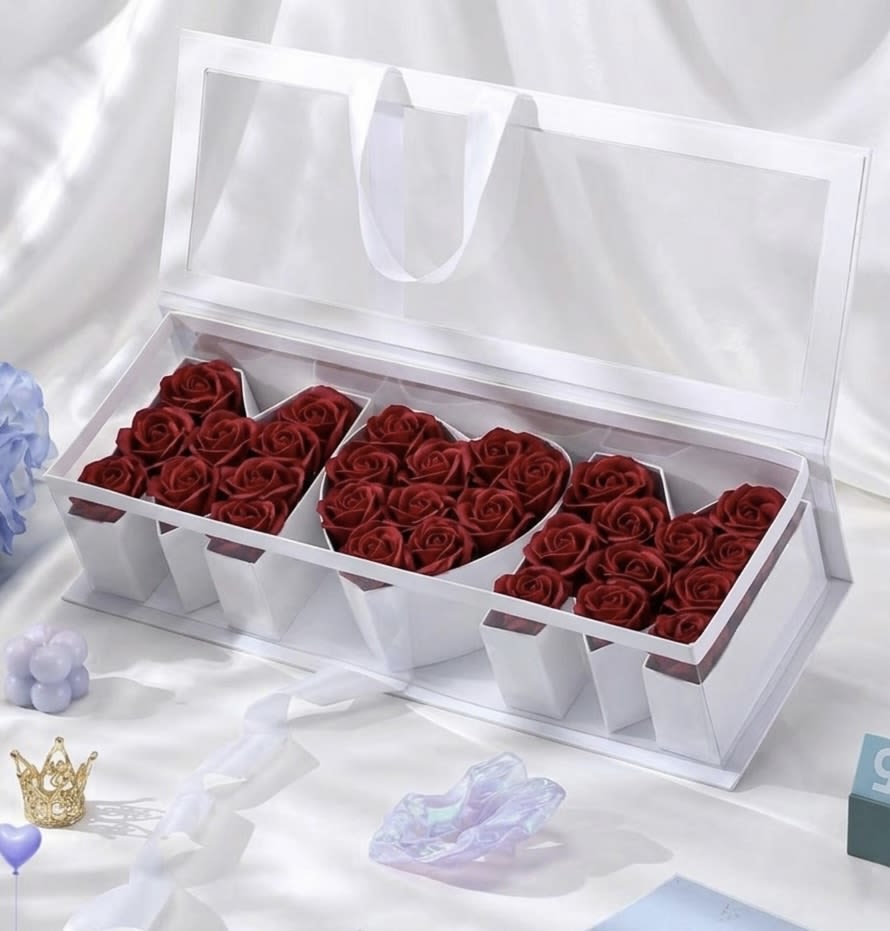 Luxury Heart Roses – Mother’s Day Edition - Make Mother’s Day unforgettable with this stunning “LOVE” rose arrangement, designed to express everything words cannot.  This elegant acrylic box features fresh roses carefully arranged to spell “LOVE,” creating a modern and luxurious design. Finished with a clean, transparent presentation, this piece is both a floral gift and a statement décor item.  Perfect for Mother’s Day, this arrangement combines beauty, meaning, and sophistication in one unforgettable gift.  Each design is handcrafted and may vary slightly due to the natural characteristics of fresh flowers.  Limited Mother’s Day Edition.