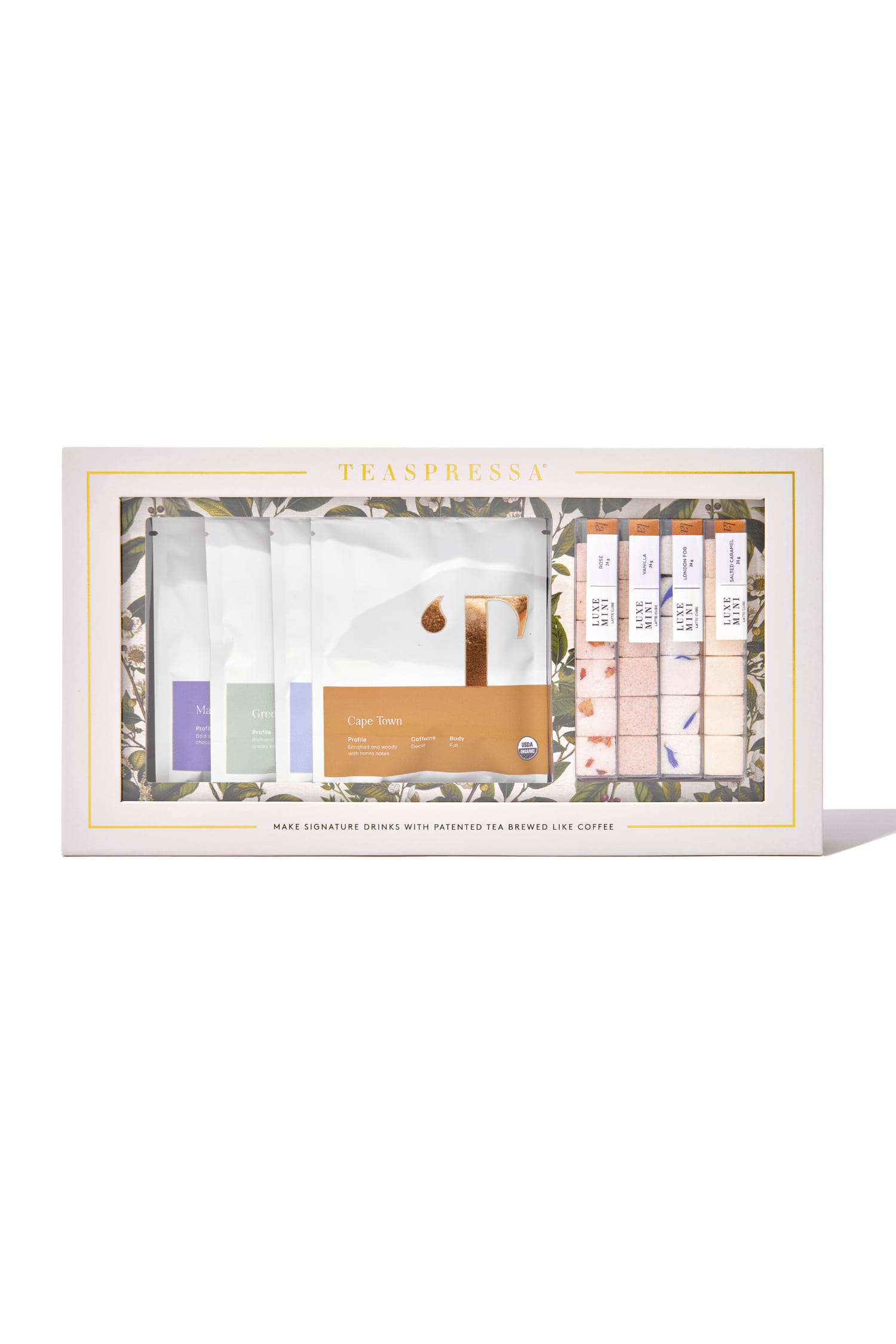 Tea gift set in a white box with assorted tea sachets and cubes
