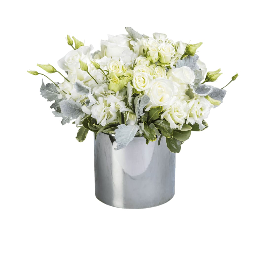 Dressed to Impress  - Do you know someone who’s hard to impress? Of course you do. This arrangement was engineered specifically for that person. Knock them off their feet (not literally - flowers are instruments of peace) with this magnificent piece of floral artistry. 