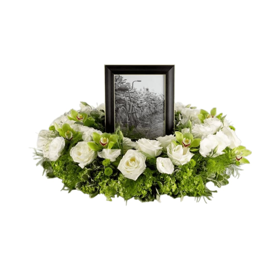 Beautiful Memories - A beautiful tribute piece and a way to frame a wonderful memory. Honor the memories by surrounding them in blooms.  Frame not included. 