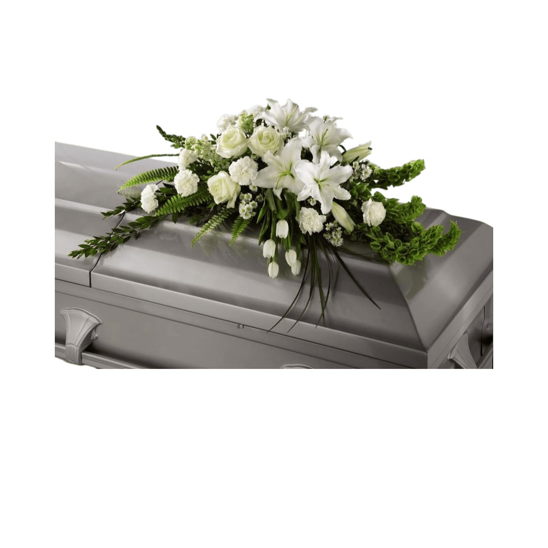 Resurrection Casket Spray - Resurrection Casket Spray inspires thoughts of comfort  and peace to those wishing to pay their respects for the loss of the deceased. White tulips, roses, snapdragons, Oriental lilies, larkspur,  carnations and monte casino asters are accented by the bright green  stems of Bells of Ireland and an assortment of the finest lush greens to  create the perfect arrangement to display on the top of their casket  during their final farewell service.     