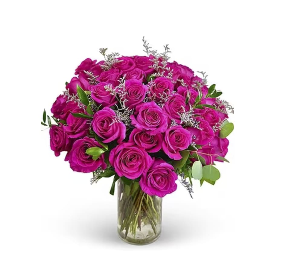  Hot Pink Rose Bouquet - Make their day with a lush and beautiful combination of hot pink roses, accenting caspia, and premium greenery, professionally styled in a timeless clear vase. sm 12 roses, 24 roses, 36 roses 