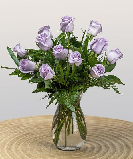 Long Stemmed Lavender Roses - SHOCKING - These long stem lavender roses will blow your loved one away. Beautiful BIG BLOOMS, one-of-kind color, long lasting and super power scent 