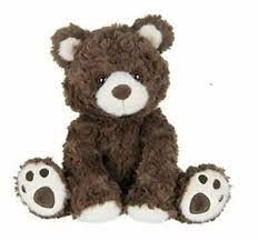 Brown teddy bear plush toy sitting on a white background