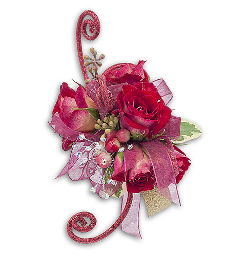 Pink rose arrangement with ribbon and decorative accents