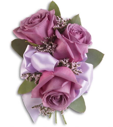 Small bouquet of lavender roses with satin ribbon and greenery