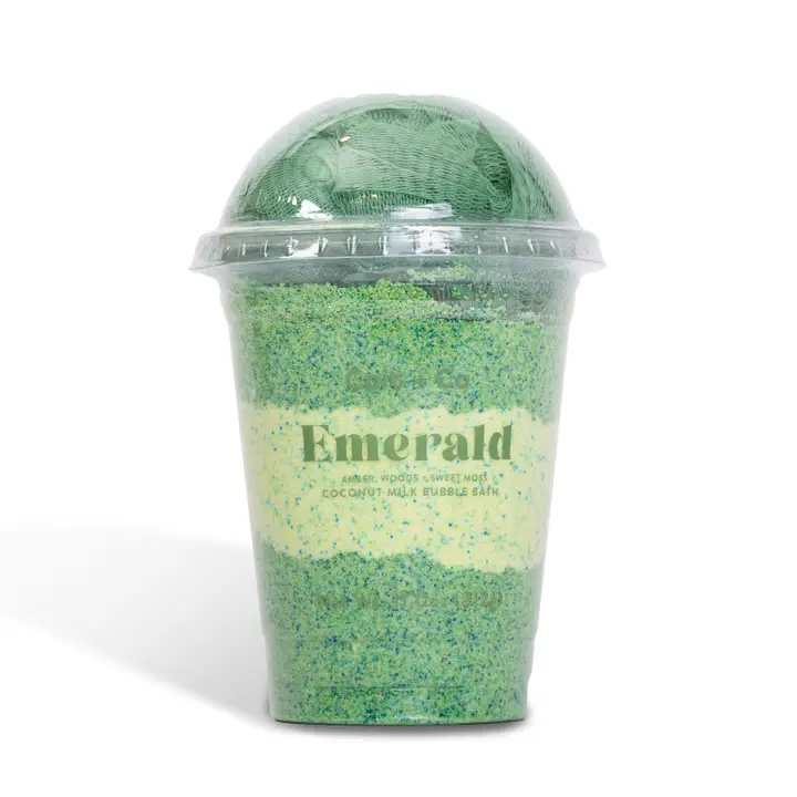 Green bubble bath in a clear plastic cup with a dome lid
