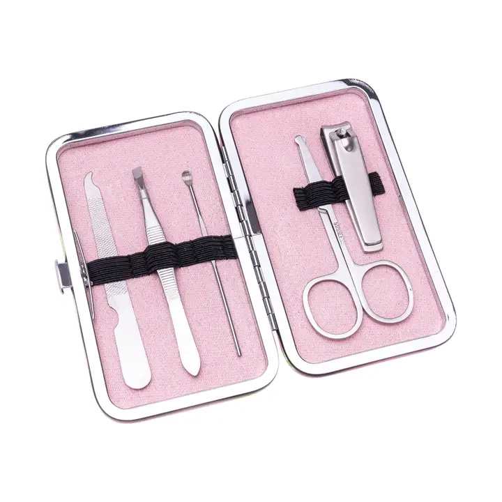 Pink manicure kit in an open metal case with nail tools