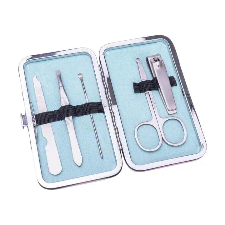 Open manicure kit with nail tools in a blue case