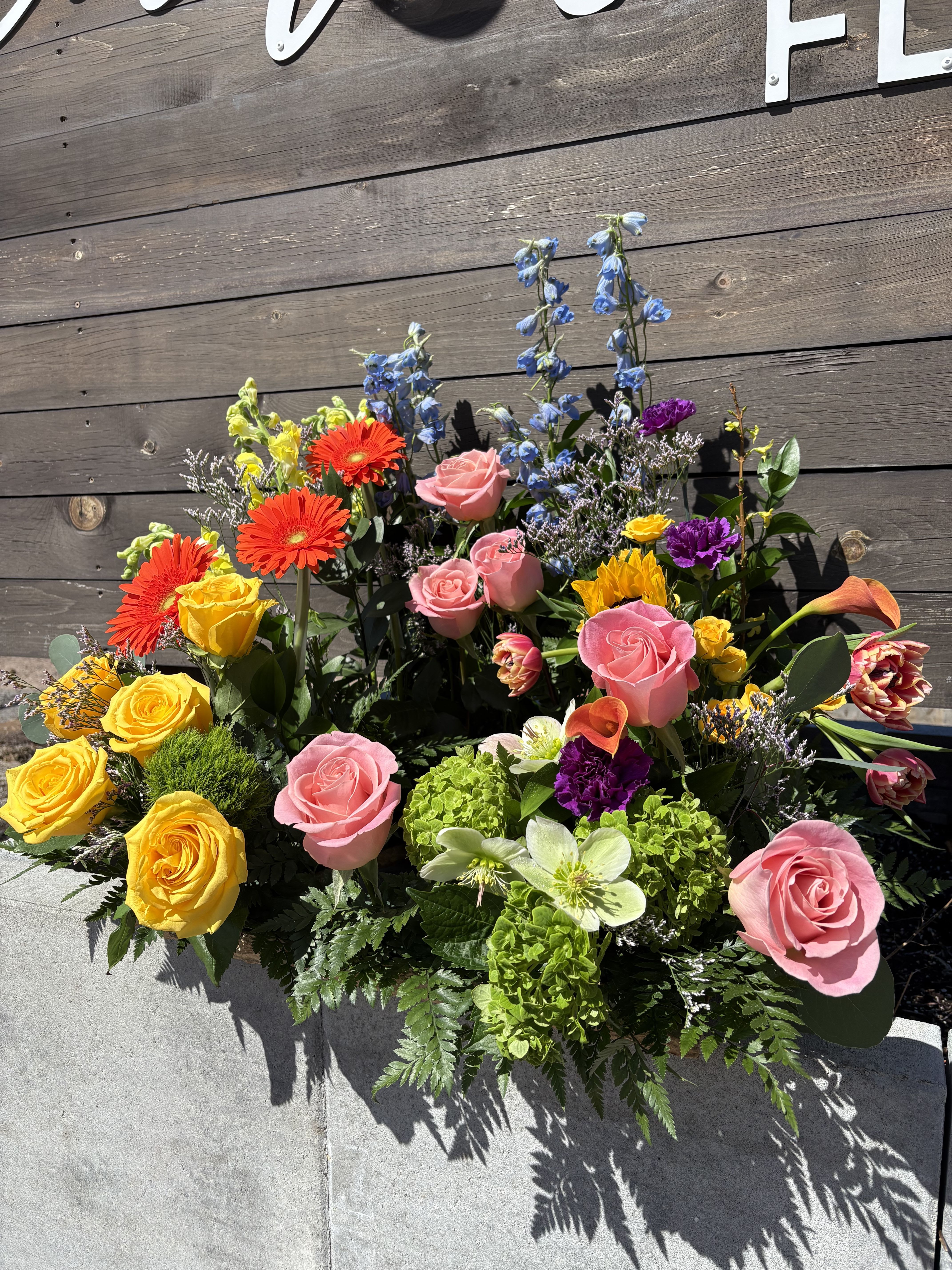 In The Garden- Sympathy Urn Wreath - The In The Garden urn wreath captures the serene beauty of a peaceful garden, symbolizing rest, renewal, and everlasting remembrance. Crafted with care and dignity, this urn wreath serves as a meaningful tribute, honoring a life cherished and forever remembered.