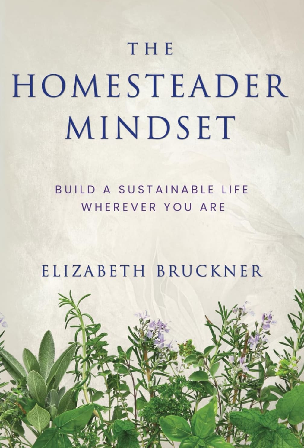 Book cover with the title The Homesteader Mindset and herbs at the bottom