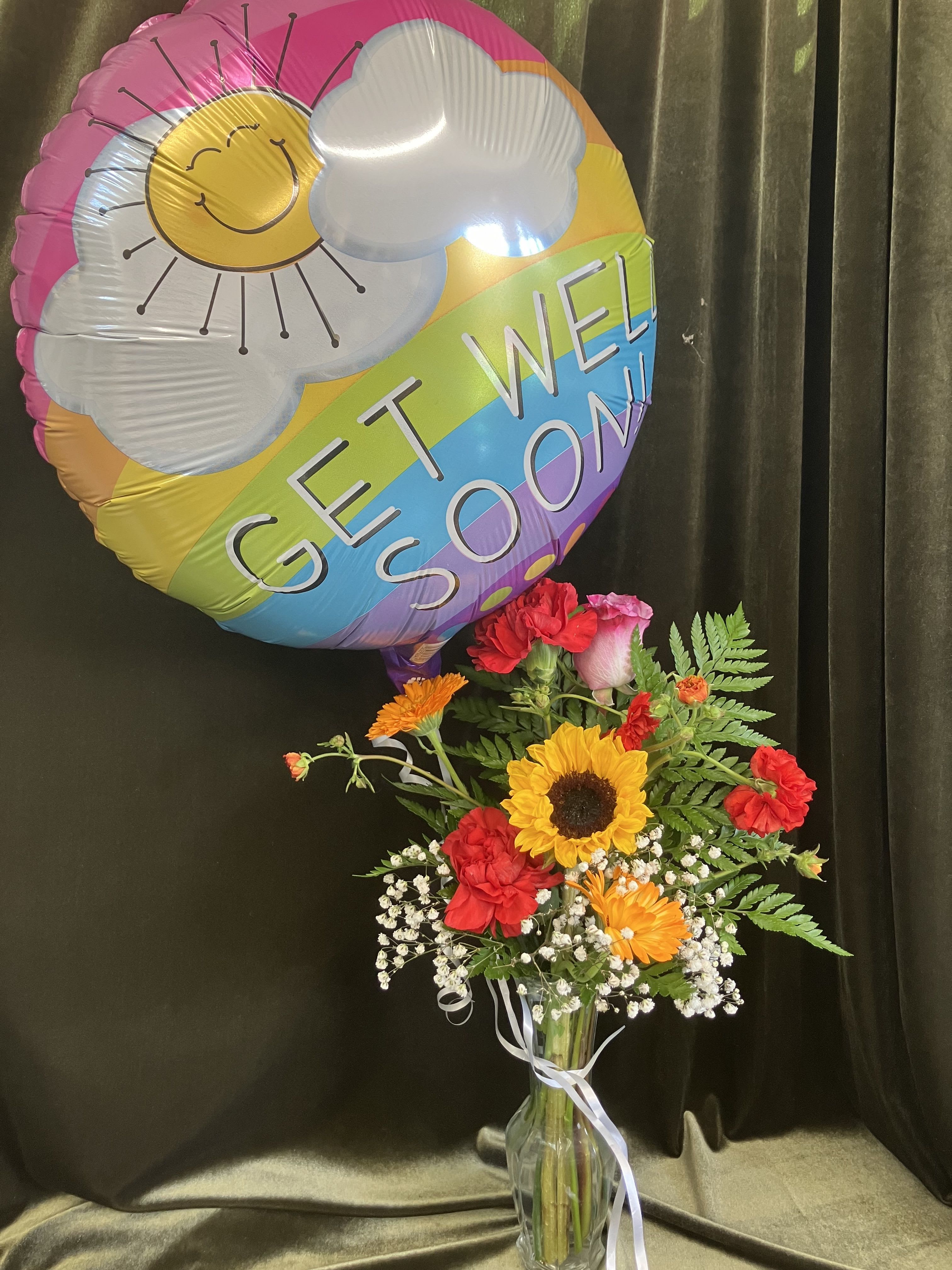 Get Well Flowers and Balloon  - Have a loved one in the hospital or recovering? Send a cheerful balloon and a bright flower arrangement! 