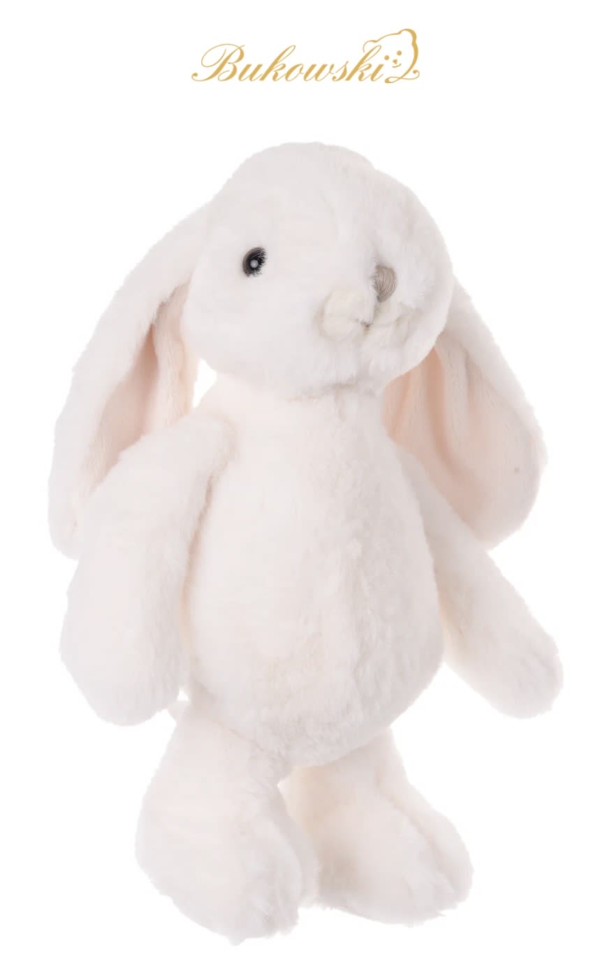 Plush white bunny with long pink-lined ears