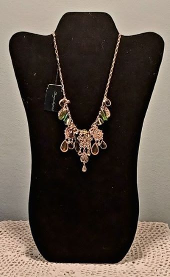 Necklace by Designs de Jour - Beautifully crafted in greens and golden embellishments, this piece measures 9" long. The 'drop' of this necklace has a golden butterfly and is therefore called Bohemian Butterfly.   