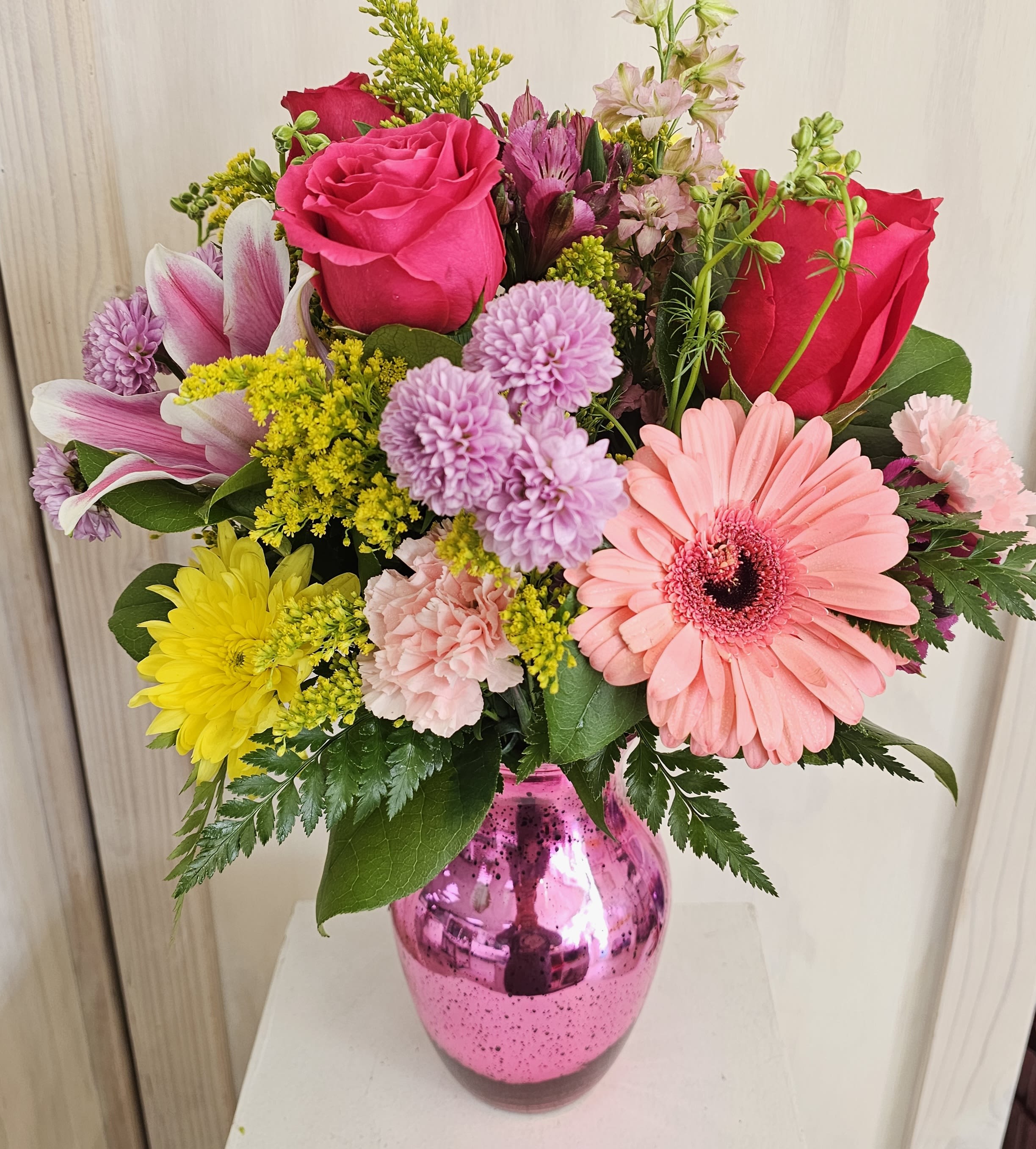 Birthday Blooms - This is a designers choice birthday/celebration bouquet that will have a bright mix of lilies, gerberas, roses, carnations, solidago, snap or stock flowers and daisies.