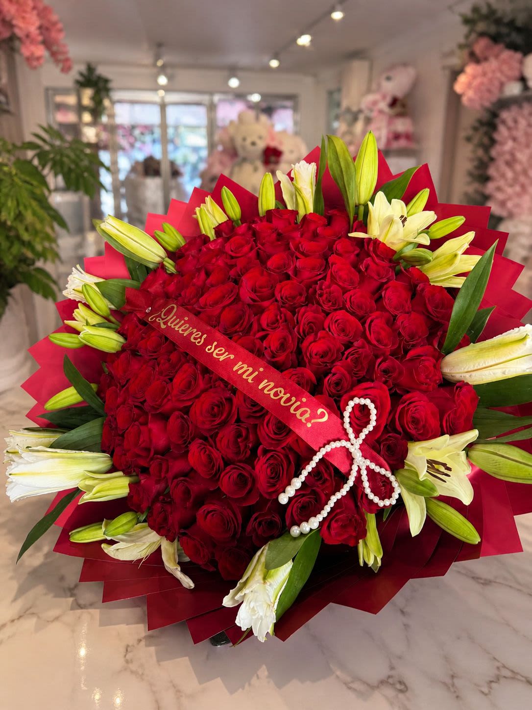 Romantic Bliss Bouquet - 50 Roses + Lilis  - Bouquet 50 Red Roses + Lilis  Decorative elements are available at an additional cost