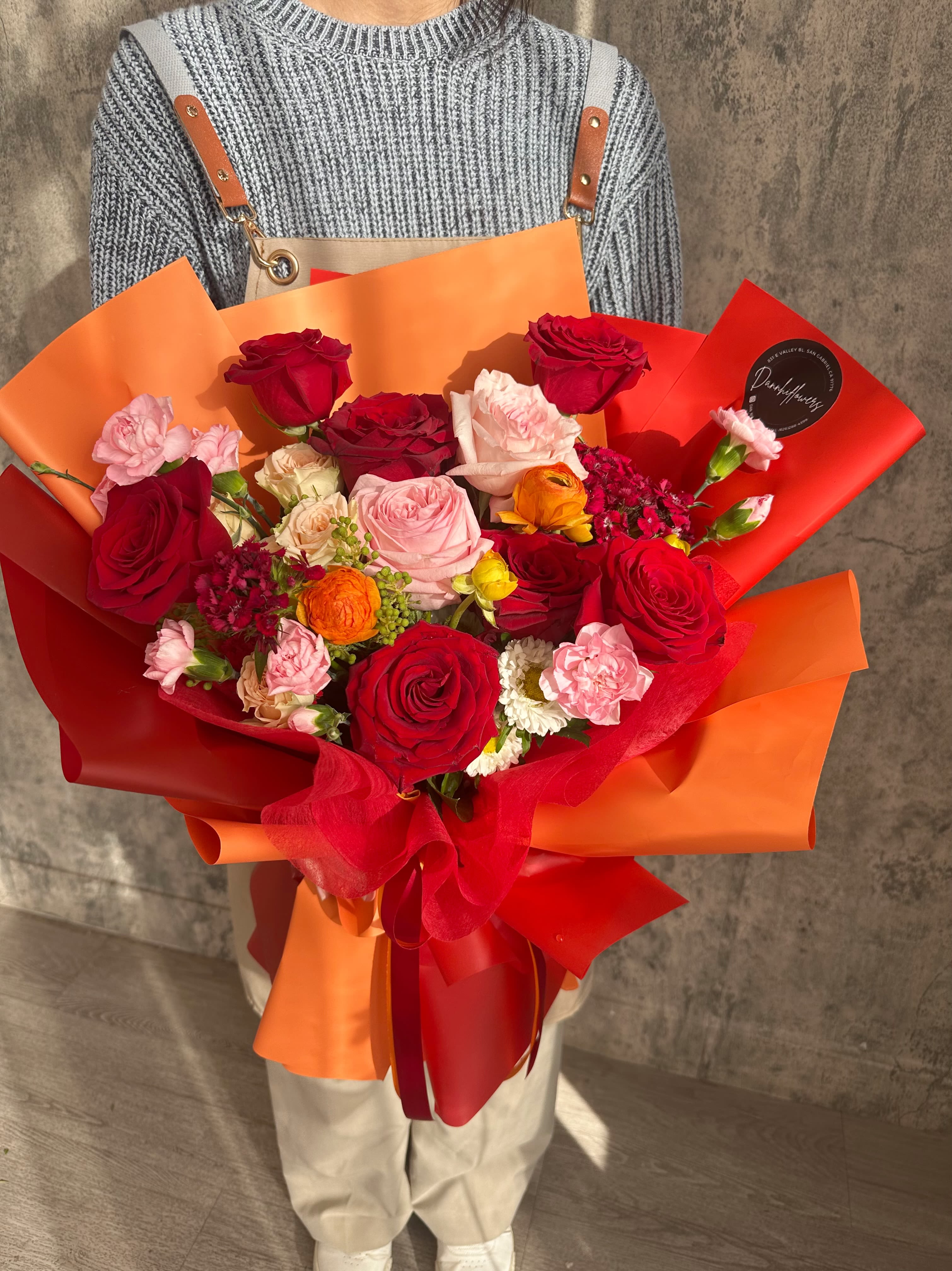 Sunset Symphony  - The vibrant bouquet captures the warmth and brilliance of a sunset, making it perfect for any joyous celebration or heartfelt gesture. Photo is DELUXE size. STANDARD size will e little smaller .